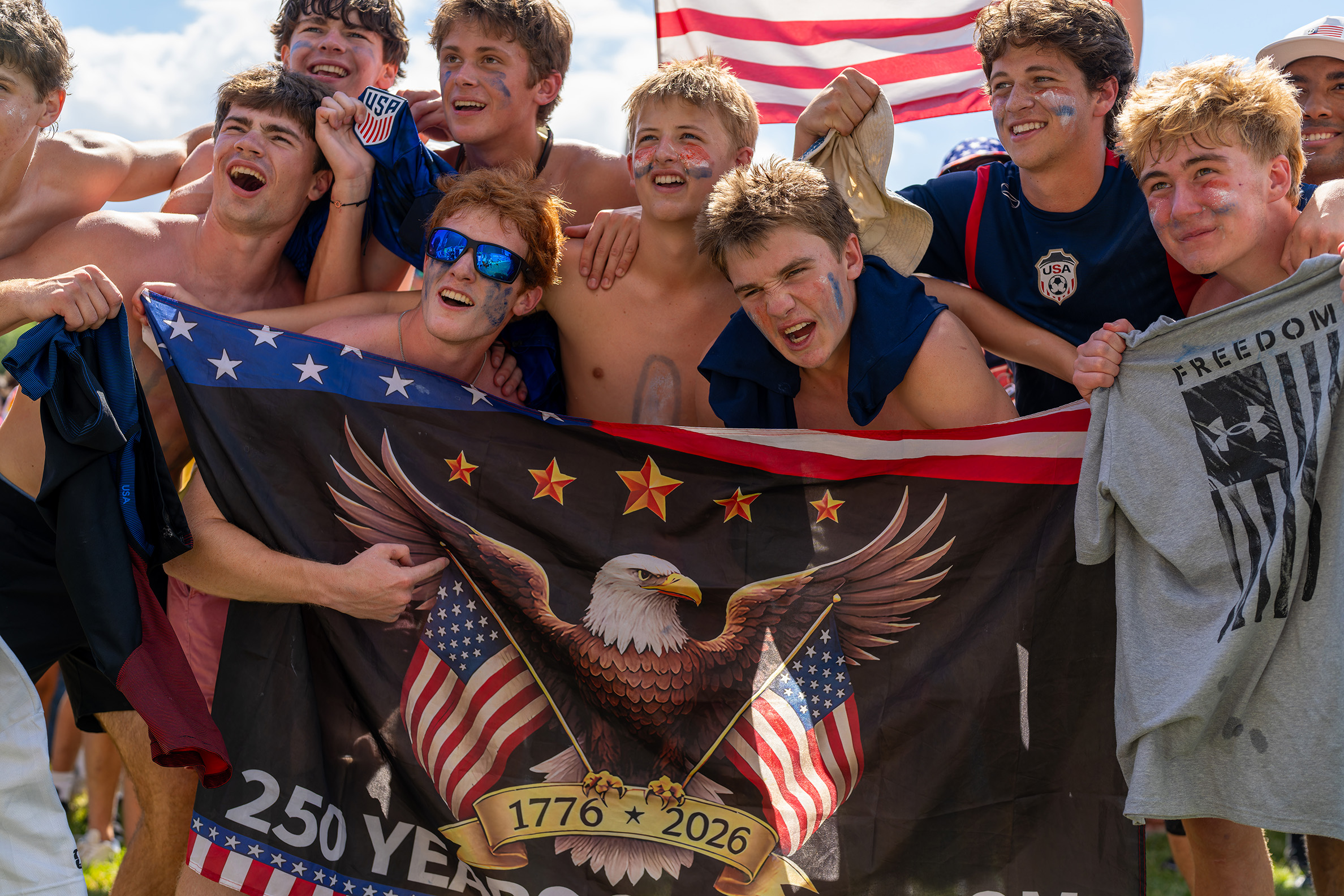 Fans watching the US Men's National Team defeat Australia at the Freedom 250 FIFA Fan Zone