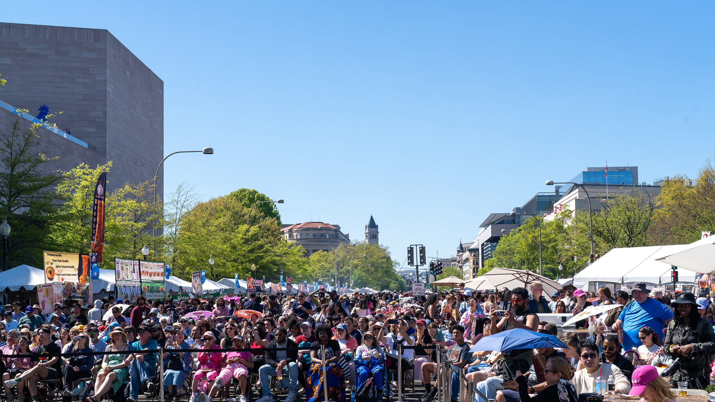 Performers and crowds at Sakura Matsuri in Washington, DC